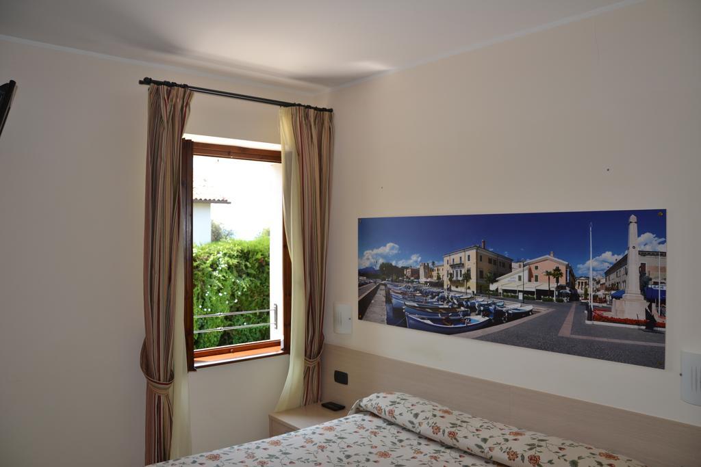 Locanda Le Palafitte Bardolino Rum bild