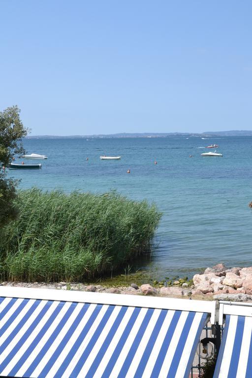 Locanda Le Palafitte Bardolino Rum bild